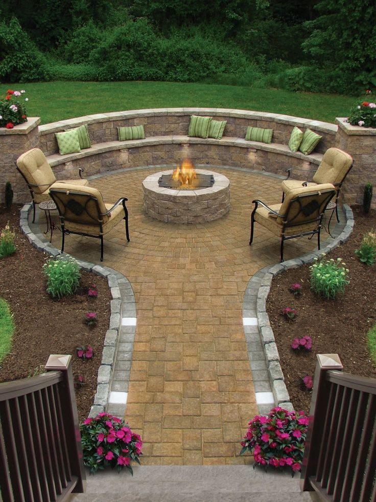 Fire pit with wall of seats.. LOVE!