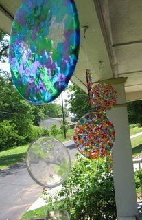 ~So simple! Layer cheap plastic beads in cake pans (no lining required), melt at 400 for 20 minutes,let cool, & then just flip them out. Drill a hole in it to make it a suncatcher! Great “craft” for kids (choose the colors, arrange them in the pans) to make as gifts for grandparents or teachers. Oooh – could small ones be used as coasters? Look like glass but not breakable!
