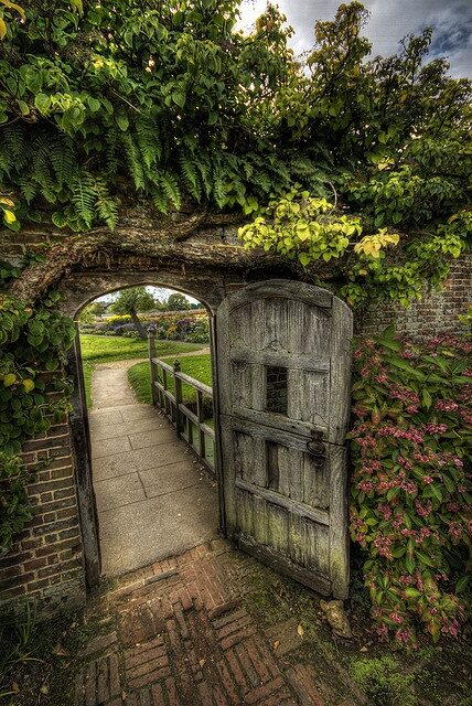 Through the garden gate  Love this reminds me of the secret garden :)