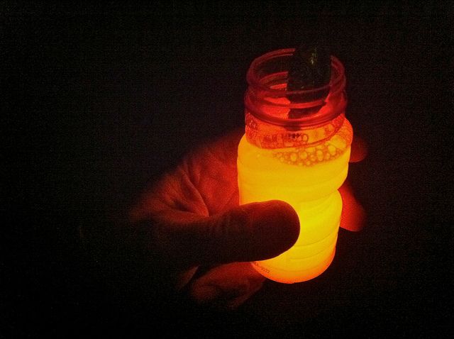 COOLEST THING EVER!!!   Cut open glow sticks & pour them into bubble solution. Glow in the dark bubbles. Summer nights here we come!