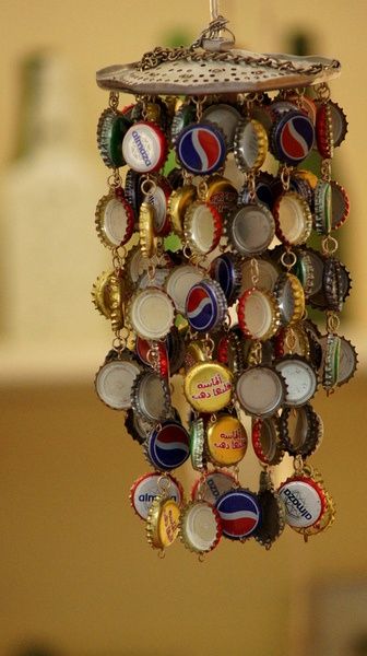A classic DIY wind chime / garden art idea: Repurpose bottle caps. Love this!! | REPINNED