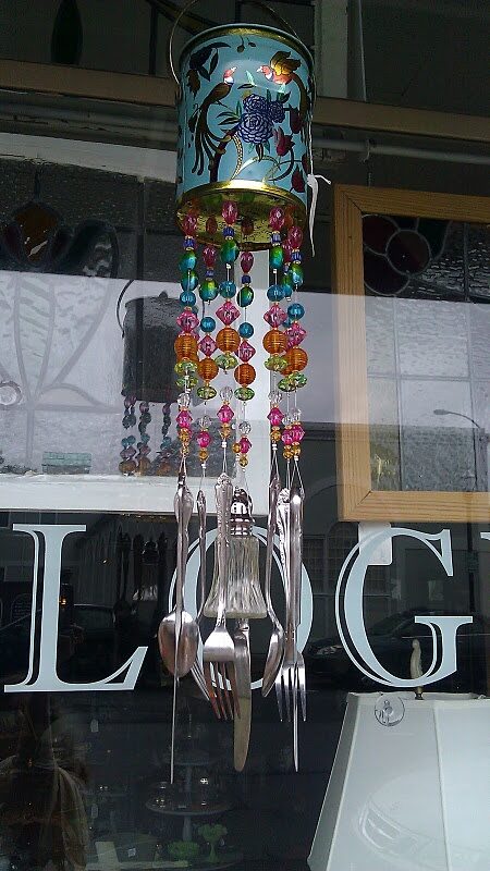 Love these wind chimes…made of silverware with salt shaker in center…also like the idea of using a pretty tin to hang it from with pretty beads.