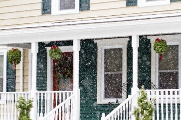 hang mistle toe kissing balls on porch in winter