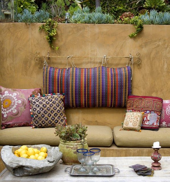 I love every single thing about this!!! How cool would it be to have a concrete wall instead of a fence? complete with succulents growing out of the top, or something fabulously viney? Could be built with cinder blocks, then stucco-ed over! I want this!