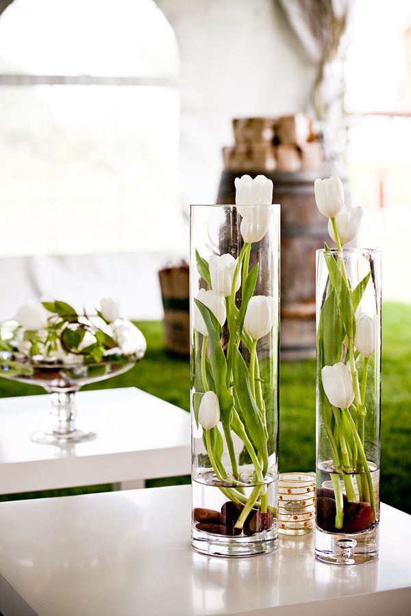 Vertical vases with  tulips