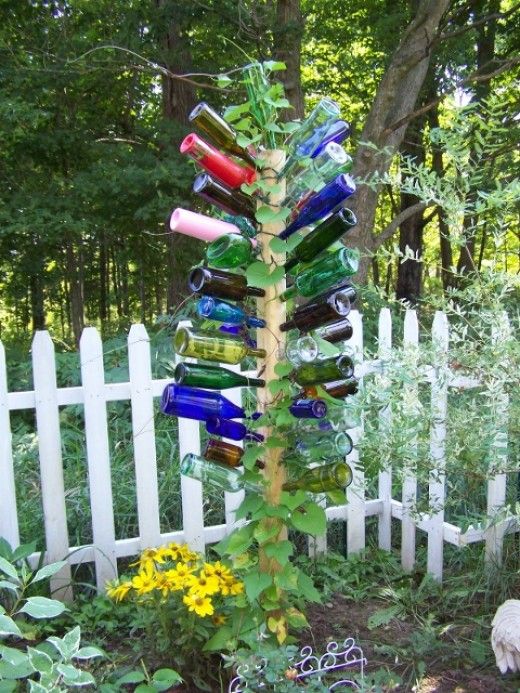 DIY bottle tree – instructions on how to make one with a wood post.