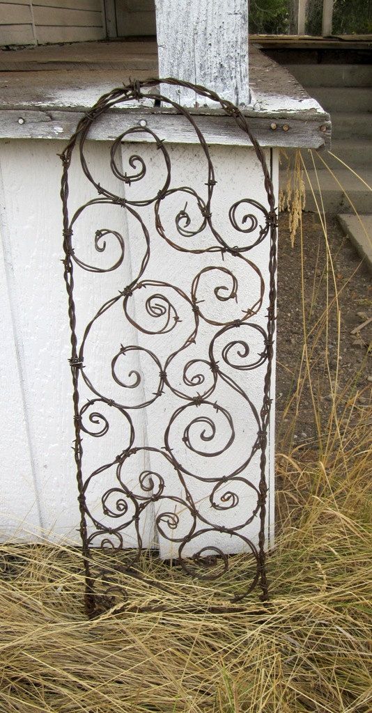 Bodacious Barbed Wire Trellis Bristling With Spiky Spirals. $57.00, via Etsy.