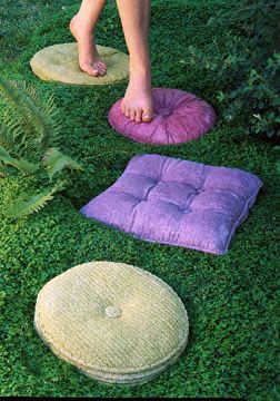 Concrete stepping stones that look like vintage pillows.