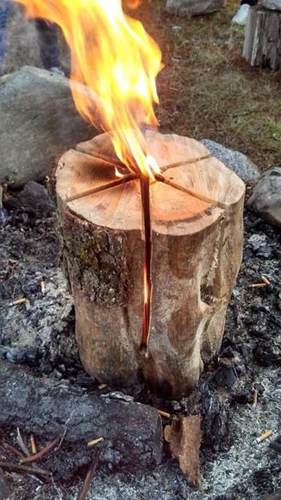 This is called a Swedish Flame. Make your wood cuts like your cutting a cake. Leave about six inches at the base, throw a cap full of fuel oil in there and it will burn up to three hours.