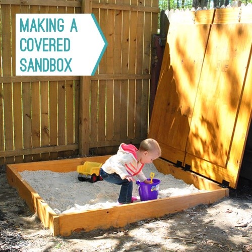 Covered sandbox to keep the cats out