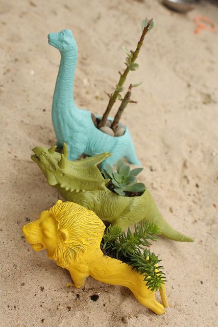 Succulant planters made out of discarded plastic animals. Just spray paint, cute a hole on the top and a drainage hole on the bottom and voila!