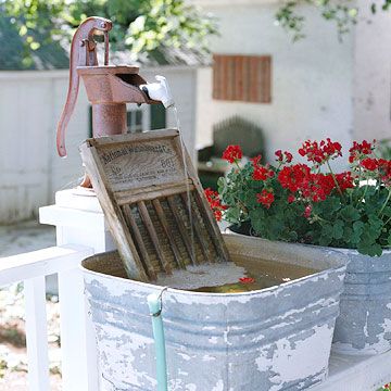 Sounds of the Country: Fountain made from an old red pump, washboard and laundry tub. Fun!