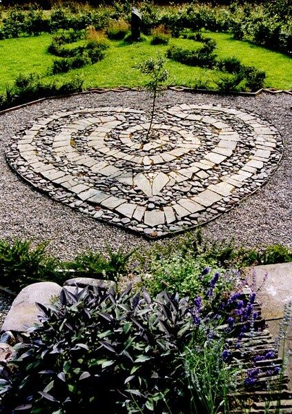 heart mosaic in garden path