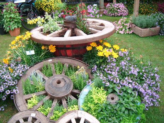A lovely herb arrangement with wagon wheels