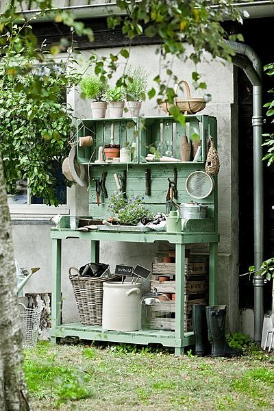 Potting table with crate shelves painted mintgreen ~ lovin it!
