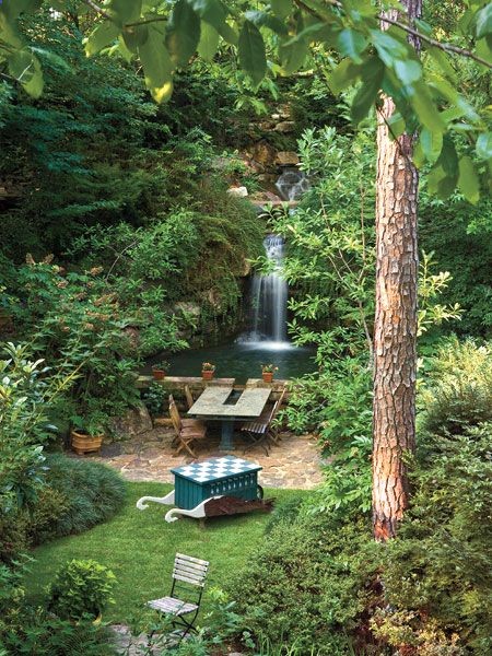 Moving water — a myriad of waterfalls, streams, ponds, and pools — unites this garden fantasy on Lake Martin, Alabama. (Photo: Ralph Anderson)