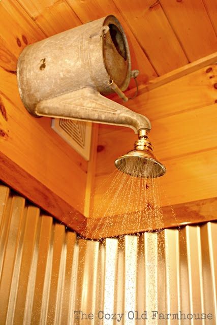Old watering can for an outdoor shower! Great for a cabin…