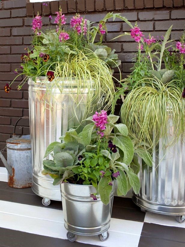 Rolling trash cabs converted into very pretty containers.