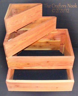 Have Gary build this on a larger scale, to replace our front stairs….Would be pretty as a raised flower bed or cover the tops, and use them as a place to put potted plants..