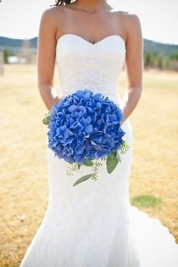 Vivid blue hydrangea wedding bouquet. What a gorgeous colour. In season during the summer months when they are their most affordable