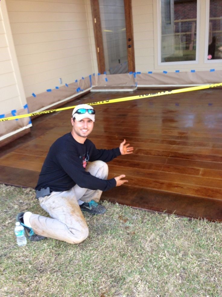Faux Wood Stained Concrete..Im intrigued! Perfect for an outdoor living space. Loving this!!!