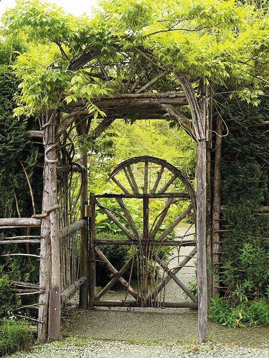 A rustic gate of cedar and willow is a fitting welcome to a cozy cottage garden filled with a riot of intertwining perennials. The matching fence discourages deer, while the arbour and its cascade of wisteria complete the tableau.
