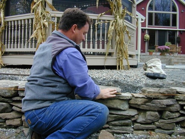 How to Build a Dry-Stack Stone Retaining Wall : How-To : DIY Network