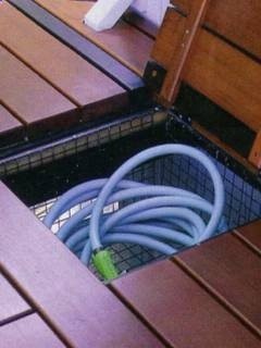 DIY Deck Storage : add a wire basket under your deck for additional outdoor storage… great idea for otherwise wasted space! Kids outdoor toys?