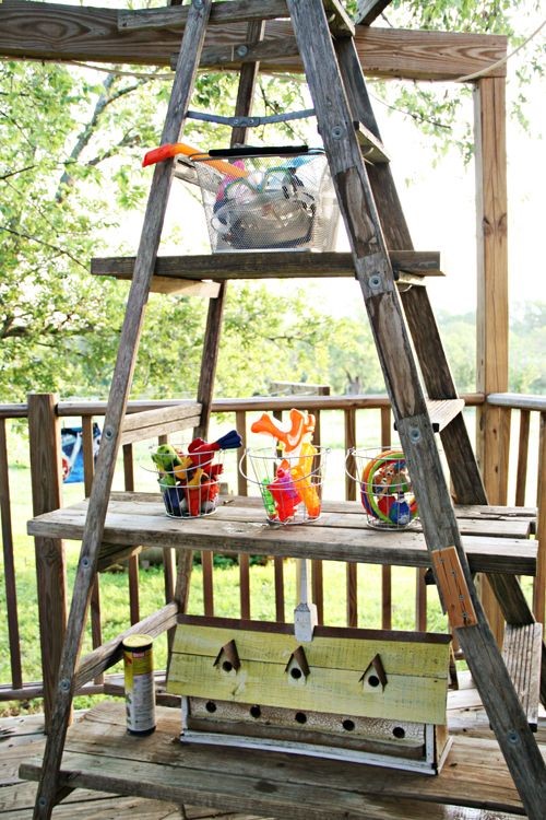 Add galv buckets for toy storage, a couple plants, birdhouse