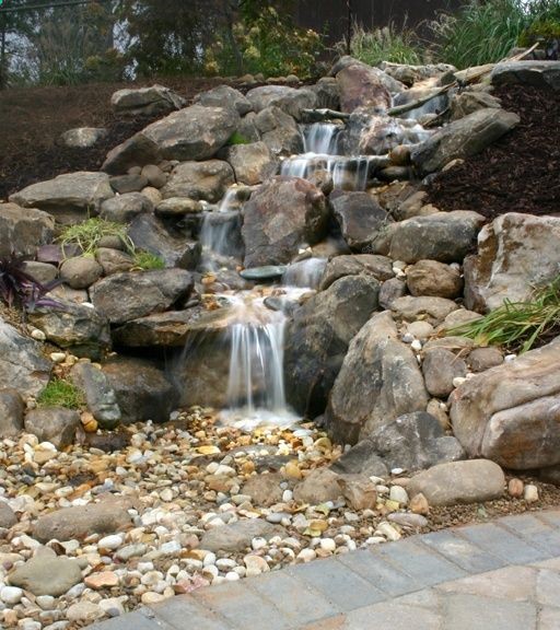 You can ditch the pond if you want a water feature with less maintenance needed. A pondless/disappearing waterfall is still a perfect garden focal point!
