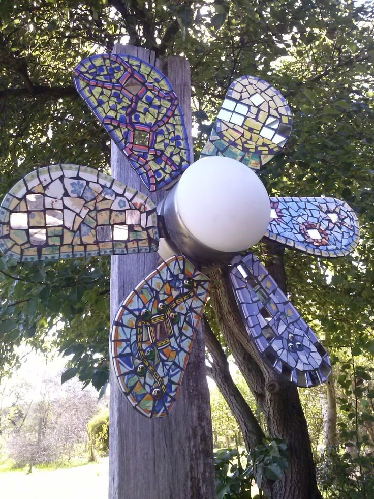 A new look for an old ceiling fan. It even spins in the wind!