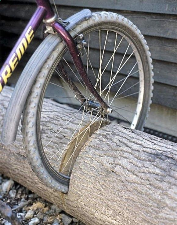 DIY Bike Stand – Great Idea. This is a must make for me. We live in the woods but always seem to have my kids friends bikes all over the driveway.
