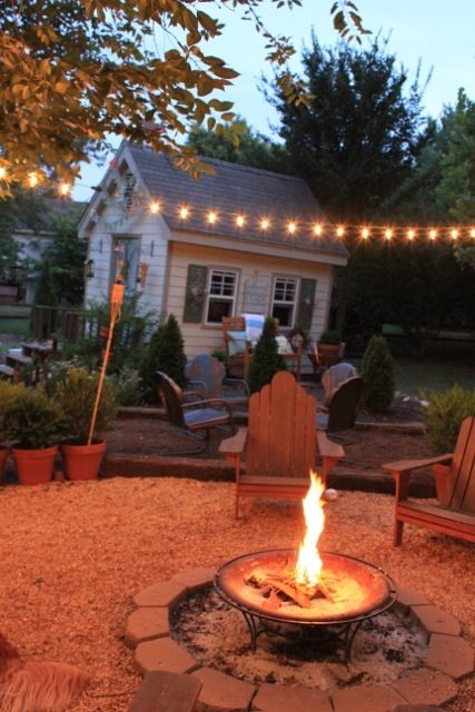 pretty firepit patio backyard area – I like the sand, rocks and simple blocks to keep everything contained.