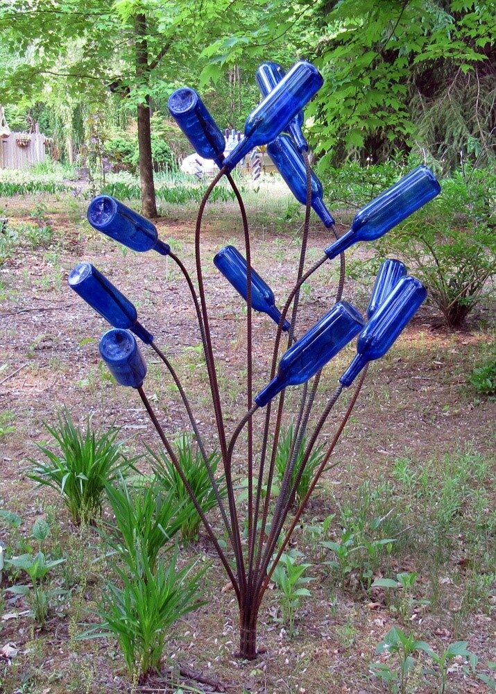 Bottle Trees were sometimes placed near the entrance to the house, so the spirits did not enter the house with you. The spirits would become mesmerized by the play of the sunlight through the colors of the glass, and become trapped inside the bottles. The bottles were periodically corked and thrown into the river to wash away the unwanted spirits. In another variation of this theme, the spirits are also trapped in the bottles, but are said to be destroyed when the sun comes out the next morning.