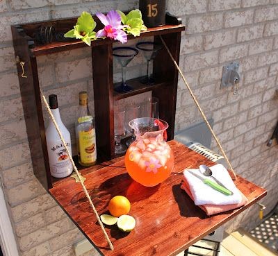 Compact Bar Space… Love this! Even if youre not doing the bar idea, you can still have a refreshment station up high, off the table (and out of reach of small hands)!
