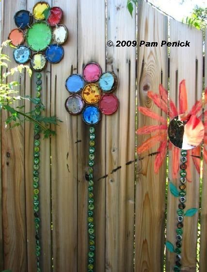 Perhaps an outdoor art installation? Paint lids, bottle caps: flower bed art.