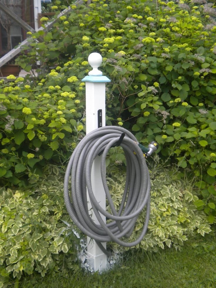 DIY garden hose hanger with 4 x 4 painted wood   finial   hardware store hose holder