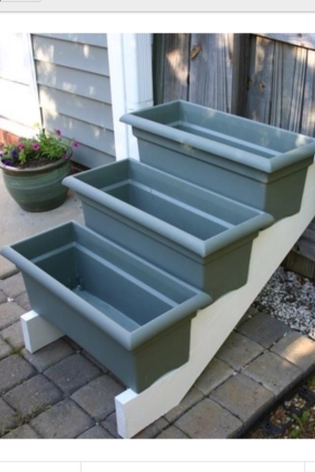 Small garden area? Purchase stair risers from your local home improvement store…paint it white and add some window boxes… small herb garden?